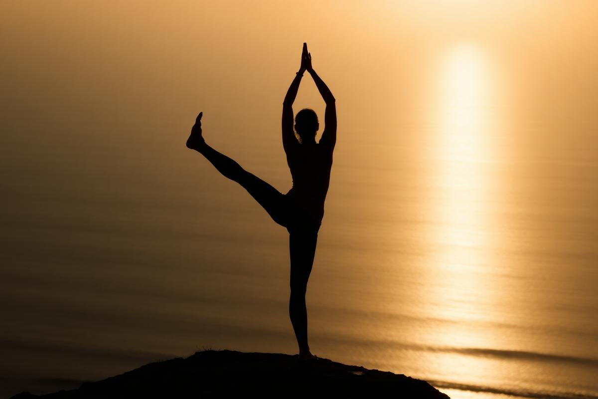 Yoga pose at sunset